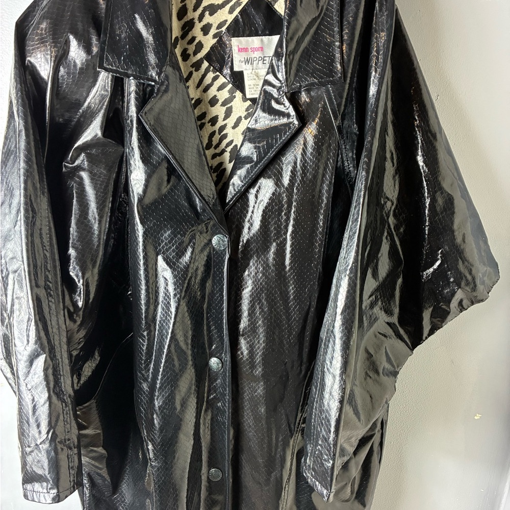 Wippette  80’s vintage  lack Vinyl coat  with animal prints lining.